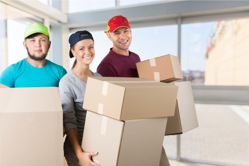 Professional movers using training and safe lifting techniques