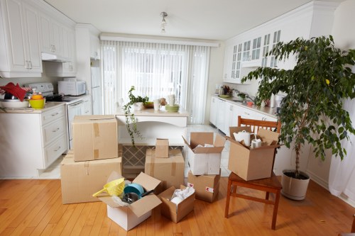 Moving crew organizing items inside a relocation truck
