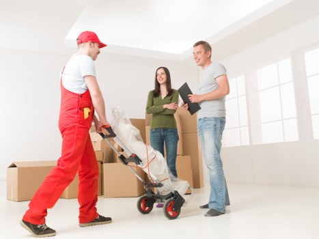 Commercial movers relocating office furniture in London
