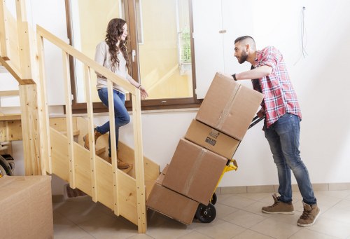 Moving company staff acknowledging a service issue quickly