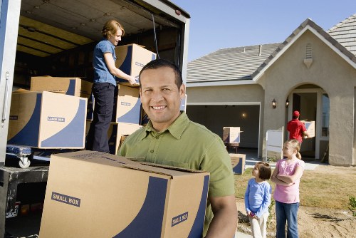 Professional movers handling flat and apartment items in London